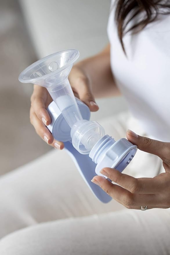 Order Now Wee Baby Practical Manual Breast Pump with a baby bottle from wee baby