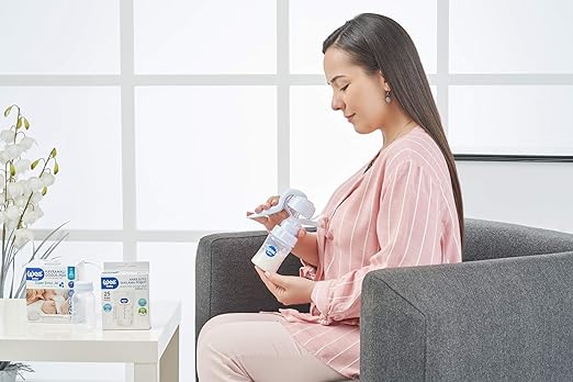 Order Now Wee Baby Practical Manual Breast Pump with a baby bottle from wee baby